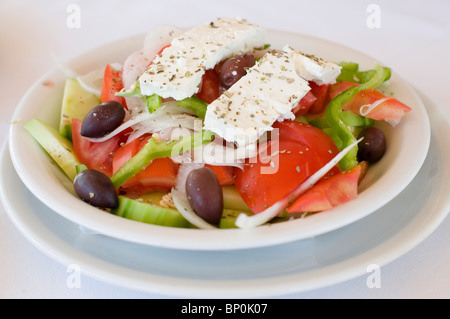 Greek Salad in a white bowl Stock Photo