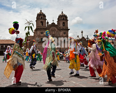 Peru, Masked dancers on Christmas Day in Cusco s square, Plaza de Armas, celebrating the Andean Baby Jesus, Nino Manuelito. Stock Photo