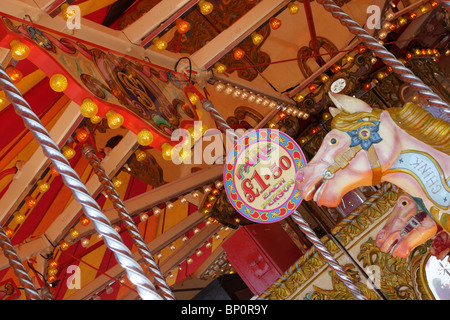 Electric Golden Gallopers merry-go-round on Brighton Beach, Sussex, England. Stock Photo