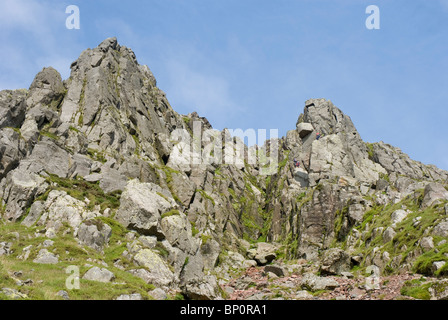 Climbers heading up to Napes Needle on Great Napes, Great Gable, Cumbria Stock Photo