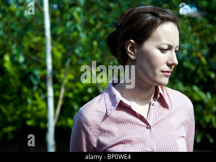 Portrait of woman deep in thought Stock Photo