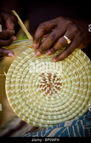 Barbara Manigault, a Gullah sweet grass basket weaver at her stand in Mt Pleasant, SC.  Stock Photo