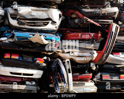 License available at MaximImages.com - Piled up crushed cars on a scrap yard Stock Photo