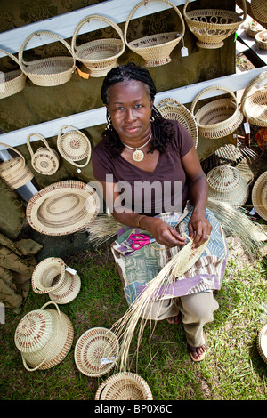 Barbara Manigault, a Gullah sweet grass basket weaver at her stand in Mt Pleasant, SC. Stock Photo