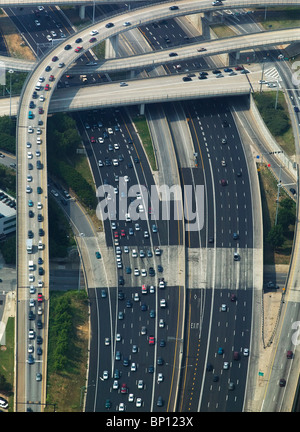 aerial view above rush hour traffic timed access to interstate I-75 I-85 Atlanta Georgia Stock Photo