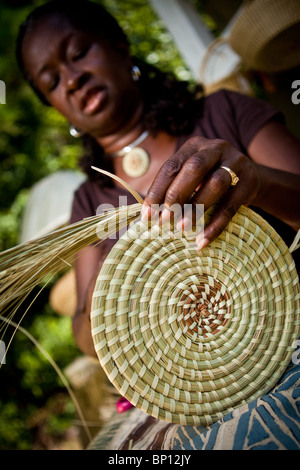 Barbara Manigault, a Gullah sweet grass basket weaver at her stand in Mt Pleasant, SC.  Stock Photo