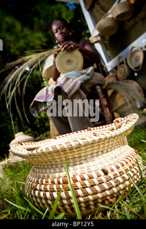 Barbara Manigault, a Gullah sweet grass basket weaver at her stand in Mt Pleasant, SC. Stock Photo