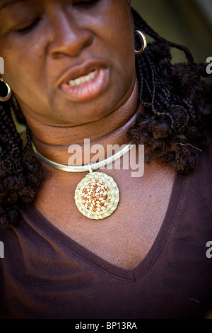 Barbara Manigault, a Gullah sweet grass basket weaver at her stand in Mt Pleasant, SC. Stock Photo