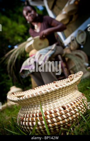 Barbara Manigault, a Gullah sweet grass basket weaver at her stand in Mt Pleasant, SC. Stock Photo