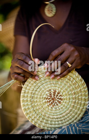 Barbara Manigault, a Gullah sweet grass basket weaver at her stand in Mt Pleasant, SC.  Stock Photo