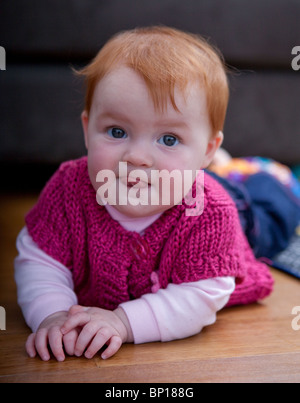 Auburn haired baby girl Stock Photo - Alamy