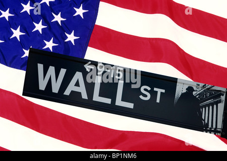 Wall street sign in front of the United States Flag Stock Photo