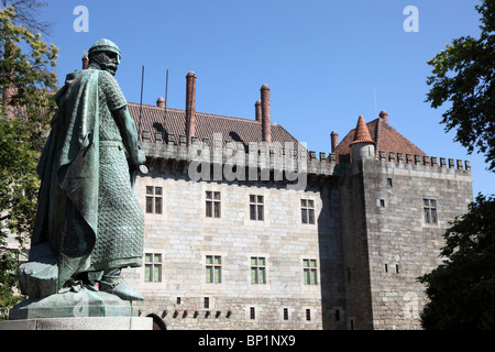 Guimaraes Castle and Statue of King Afonso Henriques, first king of Portugal Stock Photo