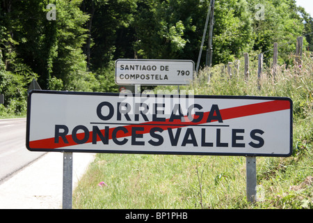 Roadsign on outskirts of Roncesvalles, start of the Camino de Santiago, with distance to Santiago de Compostella marked (790KM) Stock Photo