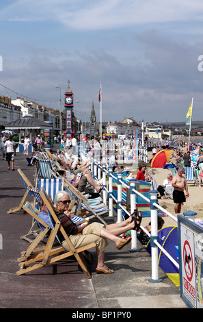 Deck chairs at Weymouth seafront Dorset Stock Photo