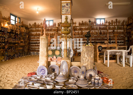 Pottery is sold in a shop in the village of Guellala on the island of Djerba, Tunisia. Stock Photo