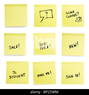 Yellow sticky papers with trendy slogans. Isolated on cork background. Stock Photo