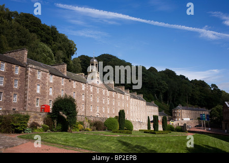 Terraced mill workers' homes at New Lanark, the industrial revolution community village managed by social pioneer Robert Owen. Stock Photo