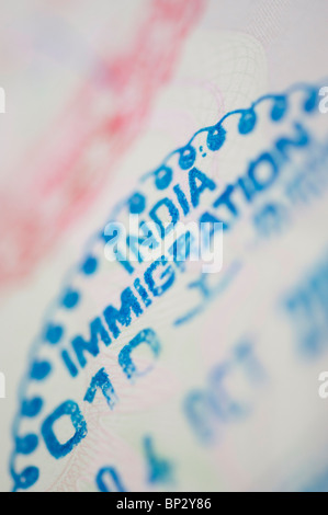 India immigration stamp in a British passport. Selective focus Stock Photo