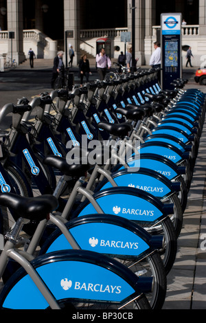 Row of blue barclays boris bikes. Bicycles Scheme aims to rent cycles to Londoners and visitors in central london Stock Photo