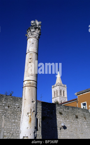 Old pillar and cathedral tower Zadar Croatia Stock Photo