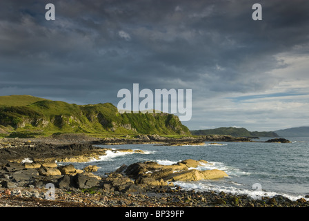 Waves breaking on a wild rocky shore on the island of Seil, Scotland Stock Photo