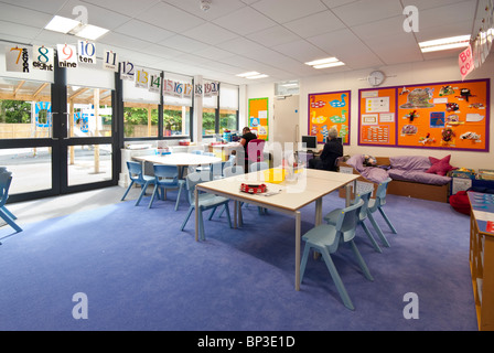 teachers but no children in Junior School classroom Stock Photo