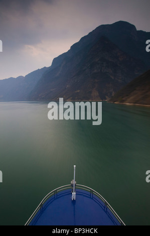 CHINA, Hubei Province. Yangzi River of Wu Gorge from moving Yangzi River Cruise Ship / Dusk. Stock Photo