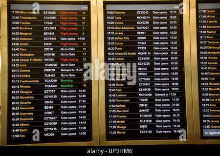Flight departure information board Gatwick airport UK Stock Photo
