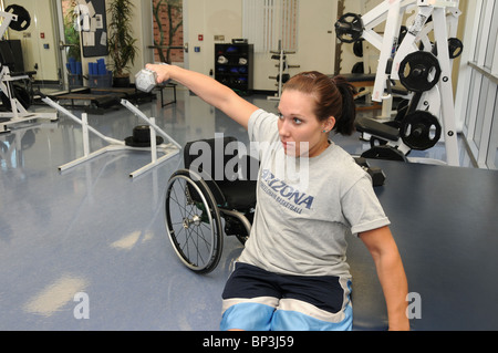 Jennifer Poist works out at the campus Disability Resource Center at the UA, where she plays wheelchair basketball. Stock Photo