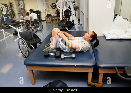 Jennifer Poist works out at the campus Disability Resource Center at the UA, where she plays wheelchair basketball. Stock Photo