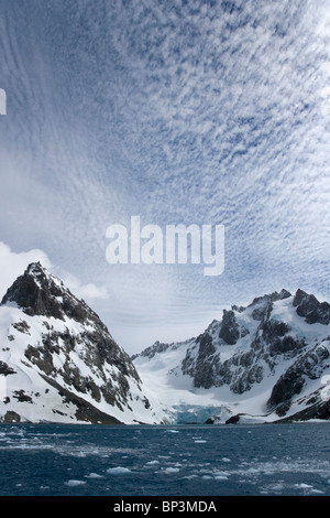 UK Territory, South Georgia Island. View of Dryglaski Fjord under thin cloud cover. Stock Photo