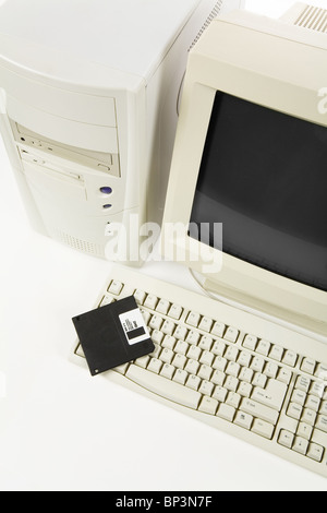 Desktop Computer and floppy Disk close up shot Stock Photo