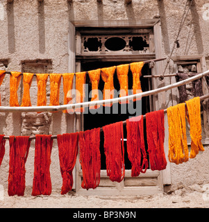 Afghanistan, Ghazni. Brightly-colored wool, recently dyed, is hung to dry in Ghazni, Afghanistan. Stock Photo