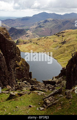 Looking down onto Stickle Tarn from the top of East Gulley on Pavey Ark in the Lake District National Park, Cumbria, England. Stock Photo