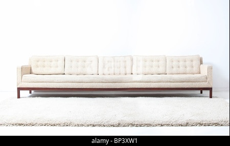 very long white modern sofa couch Stock Photo