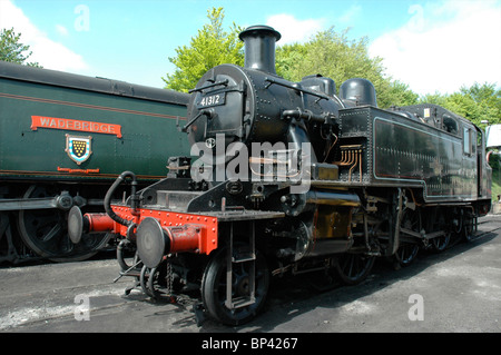 Ivatt Class 2 Tank Loco No. 41312 beside West Country Class 'Wadebridge' on the Mid Hants Railway, Hampshire, England, UK Stock Photo