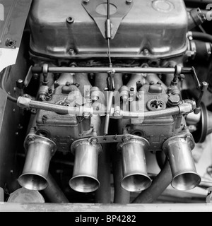 Weber carburettors of a 4-stroke 4-cylinder in-line race car. Stock Photo