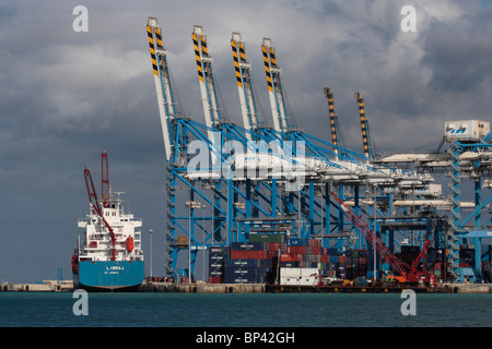 International trade by sea transport. Cargo ship at the Malta Freeport container port. Shipping, economic development and GDP growth. Stock Photo