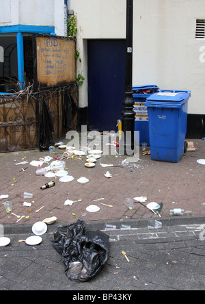 Discarded food containers littering a street in a U.K. city. Stock Photo