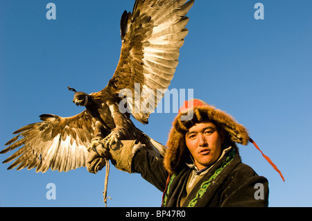 Men with eagles at Altai Eagle Festival Stock Photo