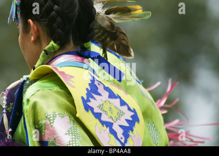 A Native American dancer performs a 'Fancy Dance' at the 8th Annual Red Wing PowWow in Virginia Beach, Virginia. Stock Photo