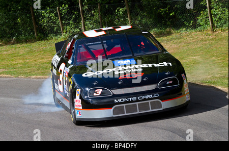 1995 Chevrolet Monte Carlo with driver Kerry Earnhardt at the 2010 Goodwood Festival of Speed, Sussex, England, UK. Stock Photo