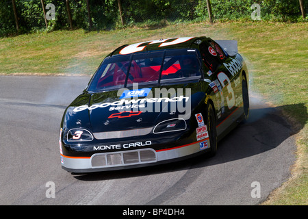 1995 Chevrolet Monte Carlo with driver Kerry Earnhardt at the 2010 Goodwood Festival of Speed, Sussex, England, UK. Stock Photo