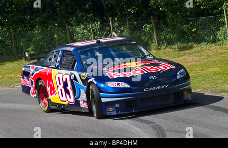 2007 Red Bull Racing Toyota Camry NASCAR with driver Mike Skinner at the 2010 Goodwood Festival of Speed, Sussex, England, UK. Stock Photo