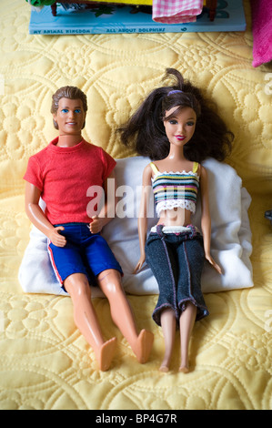 sexualization of children,Dolls,woman, man, couple, relationship, love, romance, dating,sexualization of children in the media Stock Photo