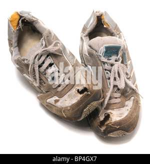 Old trainers. Worn out shoes Stock Photo - Alamy
