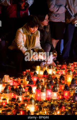 Warsaw Poland: Candles lit at the Presidential Palace in memory of president Lech Kaczynski and 95 others... Stock Photo