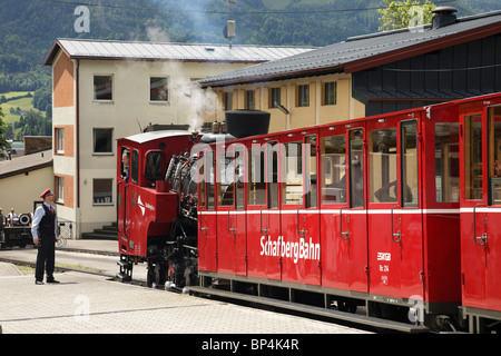 St Wolfgang, Salzkammergut, Austria. Red steam train on rack and pinion railway station platform to Schafberg mountain Stock Photo