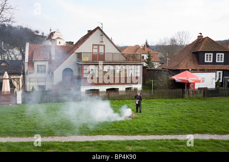 Man burning hay. Kazimierz Dolny Poland. Stock Photo